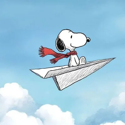 Snoopy wearing a red scarf flying on a paper airplane in the sky PFP