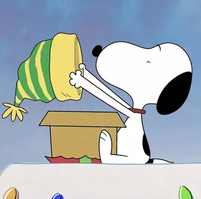 Snoopy opening a holiday gift box and holding a winter beanie PFP