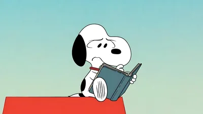 Snoopy reading a book with a confused look on his red doghouse for PC Background