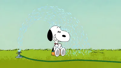 Cute Snoopy sitting on the grass enjoying a water sprinkler for PC Wallpaper