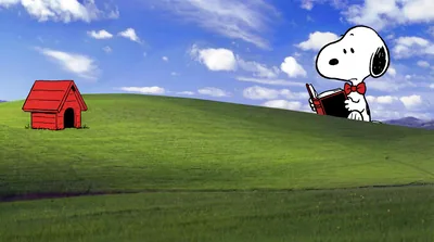 Snoopy wearing a red bowtie and reading a book on a green hill for PC Wallpaper