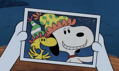 Snoopy and Woodstock wearing festive party hats in a photo for PC Background