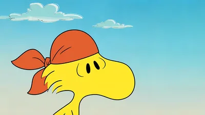 Woodstock wearing an orange bandana under a clear blue sky Wallpaper for PC