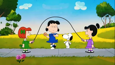 Snoopy and Lucy jumping rope outdoors with a cookie for PC Wallpaper