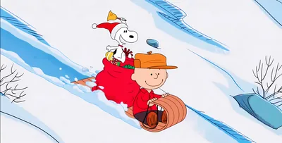 Charlie Brown and Snoopy sledding in the snow with gifts for PC Background